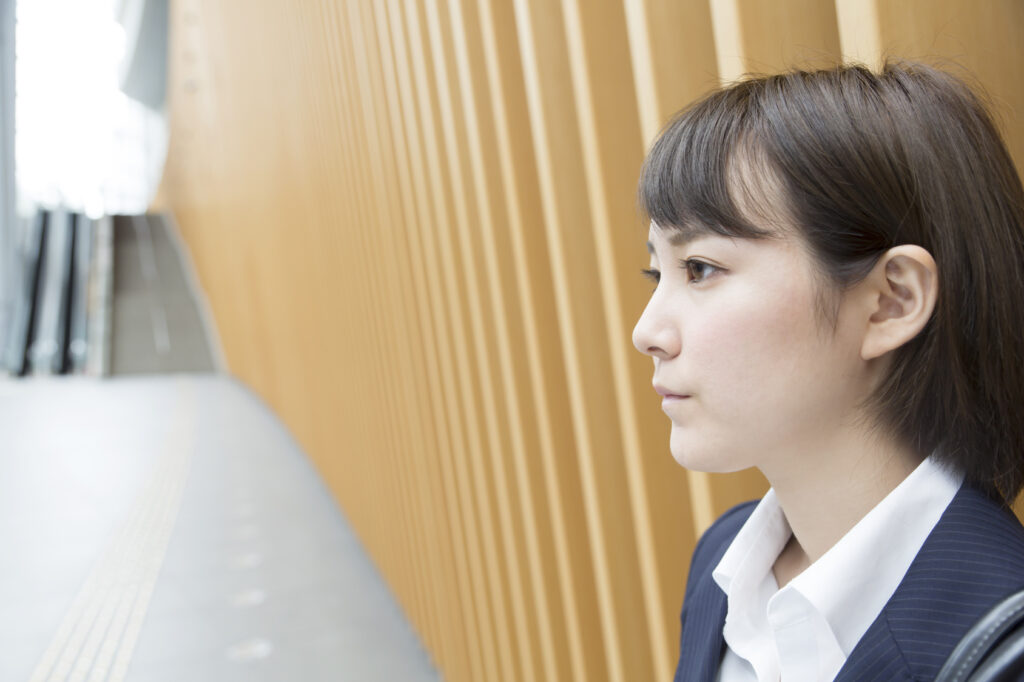 Asian Woman With Anxiety Staring at Nothing