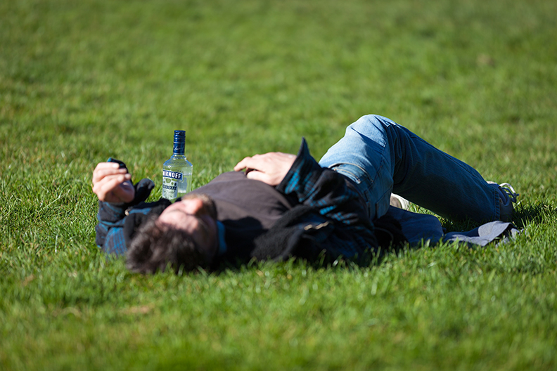 Man on Grass Hungover