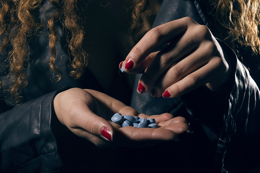 Woman Holding Xanax